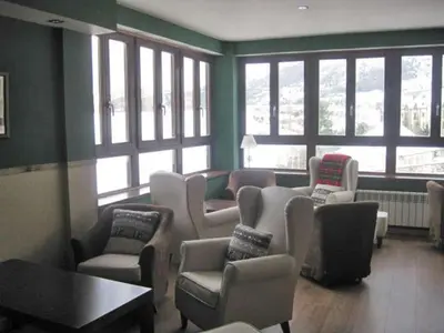 Zona de estar de Aparthotel Foratata