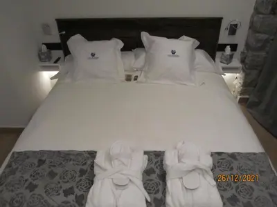 Cama o camas de una habitación en Mauberme Mountain Boutique Hotel