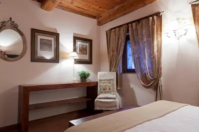 Cama o camas de una habitación en Villa Russell Hotel&Apartments