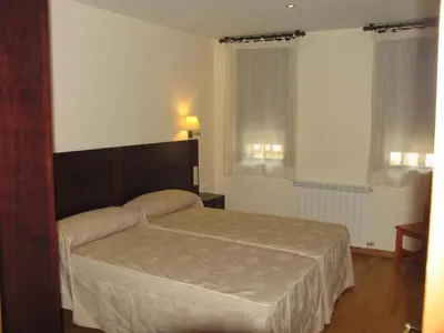 Cama o camas de una habitación en Villa Russell Hotel&Apartments