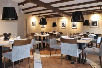 Un restaurante o sitio para comer en Hotel Vilagaros