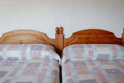Cama o camas de una habitación en El Portal de la Irene - Apartamentos Rurales