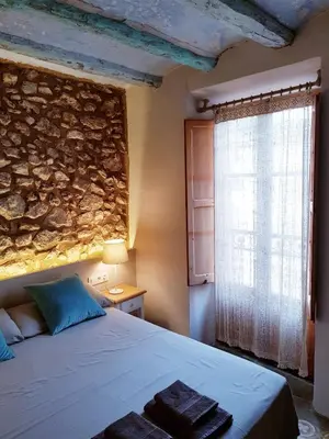 Cama o camas de una habitación en Can Jaume Porxo