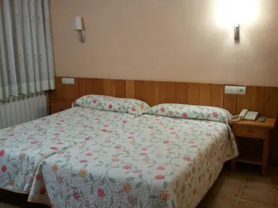 Cama o camas de una habitación en El Pilar