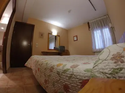 Cama o camas de una habitación en El Pilar