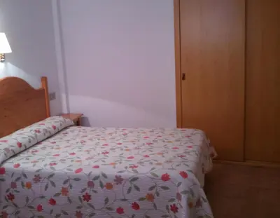 Cama o camas de una habitación en El Pilar