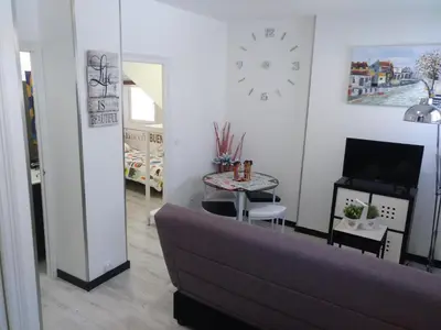 Una televisión o centro de entretenimiento en Apartamento Cigüeña 1