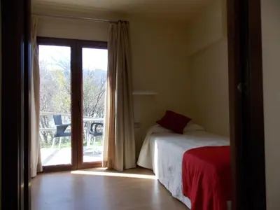 Cama o camas de una habitación en Aparthotel Bubal
