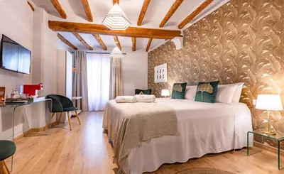 Cama o camas de una habitación en El Palauet del Priorat