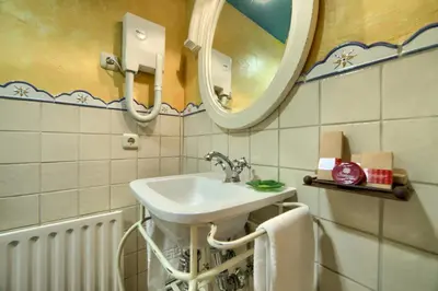 Un baño de Hotel Rural El Almadiero