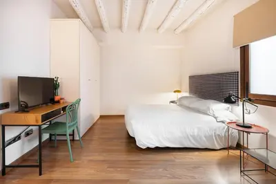 Cama o camas de una habitación en Hostal Pichorradicas