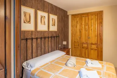 Cama o camas de una habitación en La Borda de Marco