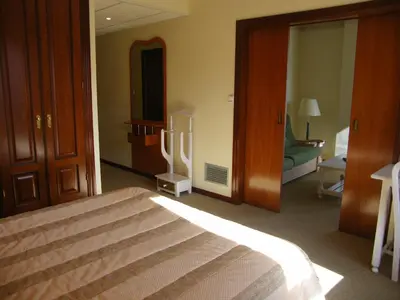 Cama o camas de una habitación en Hotel Magallón