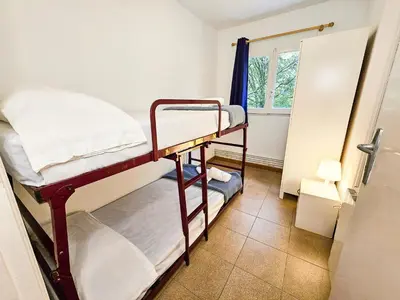 Cama o camas de una habitación en Complejo Bubal Formigal 3000
