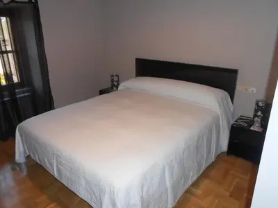 Cama o camas de una habitación en Hospedaje Nuestra Señora de Ujue