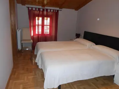 Cama o camas de una habitación en Hospedaje Nuestra Señora de Ujue