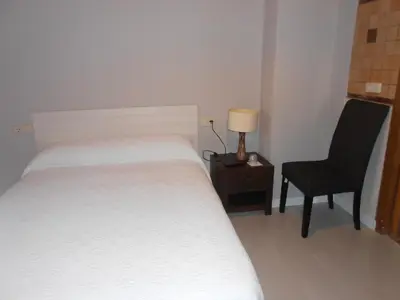 Cama o camas de una habitación en Hospedaje Nuestra Señora de Ujue