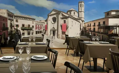 Un restaurante o sitio para comer en Hotel Ciutat de Tarrega