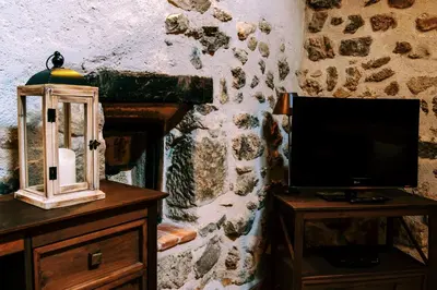 Una televisión o centro de entretenimiento en Casa el Sastre II