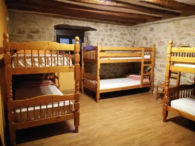 Cama o camas de una habitación en La Bodega Del Camino aka Albergue On TheLe