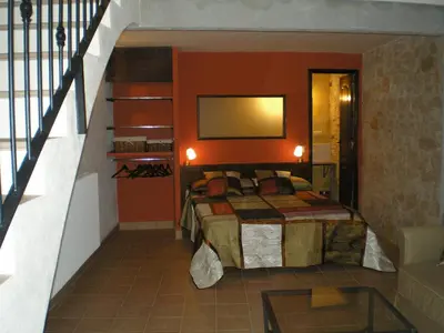 Cama o camas de una habitación en Ca l'Estruch