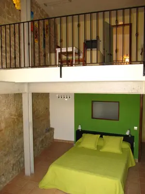 Cama o camas de una habitación en Ca l'Estruch