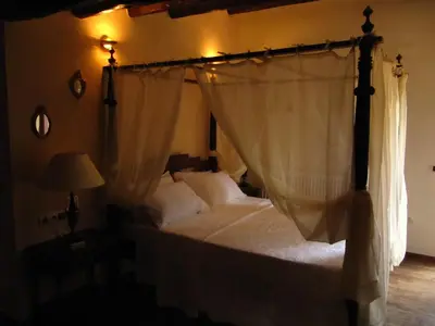 Cama o camas de una habitación en Ca l'Estruch