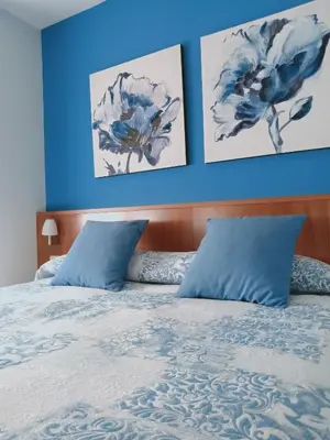 Cama o camas de una habitación en Hostal Casa Barranco