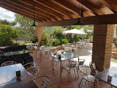 Un restaurante o sitio para comer en Mesón de Colungo