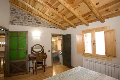 Cama o camas de una habitación en Casa rural La Masadría