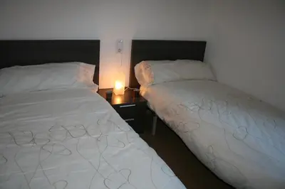 Cama o camas de una habitación en Apartamentos Panticosa