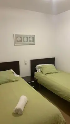 Cama o camas de una habitación en Apartamentos Panticosa