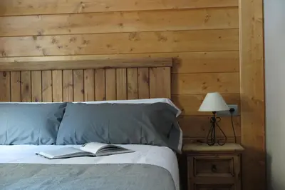 Cama o camas de una habitación en Apartamentos Casa Pochetas