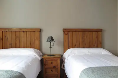 Cama o camas de una habitación en Apartamentos Casa Pochetas