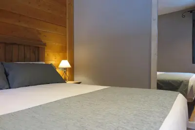 Cama o camas de una habitación en Apartamentos Casa Pochetas