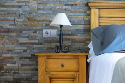 Cama o camas de una habitación en Apartamentos Casa Pochetas