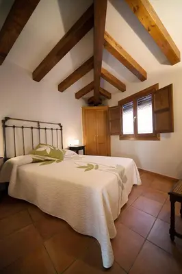 Cama o camas de una habitación en Apartamentos Casa Vidal