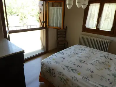 Cama o camas de una habitación en Casa con jardín frente ciudadela