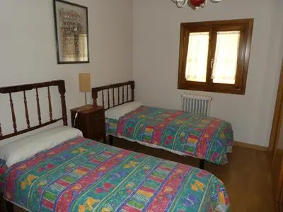 Cama o camas de una habitación en Casa con jardín frente ciudadela