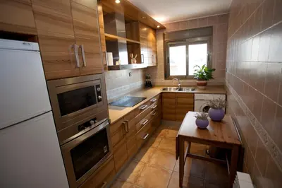 Una cocina o zona de cocina en Apartamentos Maribel