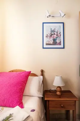 Cama o camas de una habitación en Apartamentos Maribel