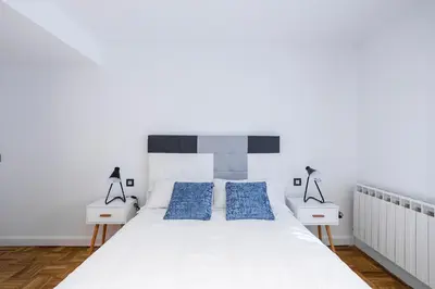 Cama o camas de una habitación en El Hogar de San Fermín