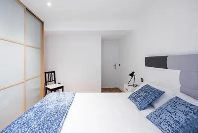Cama o camas de una habitación en El Hogar de San Fermín