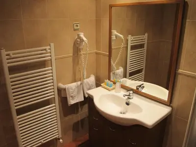 Un baño de Apartamentos Turmo