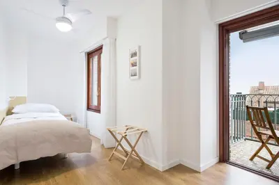 Cama o camas de una habitación en Apartamento con vistas en centro histórico