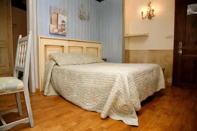 Cama o camas de una habitación en Hotel Villa de Torla