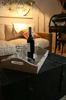 Zona de estar de Apartamentos Alcoba de Baco