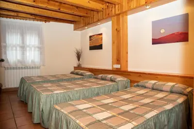 Cama o camas de una habitación en Turisme Rural Lo Pallé de Cal Bosch