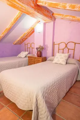 Cama o camas de una habitación en Casa Rural La Milagrosa