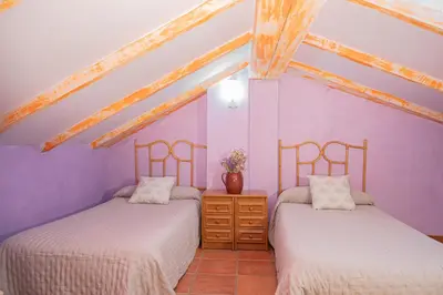 Cama o camas de una habitación en Casa Rural La Milagrosa